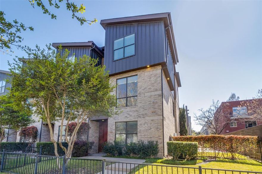 Stunning end-unit townhome in the heart of Oak Lawn, offering exceptional natural light with additional windows throughout and one of the most desirable locations in the community. This beautifully updated 2-bedroom plus study residence features the largest gated front yard in the complex—an ideal private outdoor space for entertaining, pets, or everyday enjoyment.

The first-floor bedroom showcases hardwood floors and a updated private ensuite bath, providing ultimate flexibility for guests, a roommate, or a dedicated home office. The second level is designed for both comfortable living and entertaining, featuring an open-concept layout with a gas fireplace, abundant natural light, and access to a private balcony. The kitchen is both timeless and functional, complete with granite countertops, a large kitchen island, white cabinetry, and stainless steel appliances, including a gas range.

The third floor offers a built-in study by Ligne Roset and an oversized primary suite with multiple closets and a fully updated spa-inspired bath. Enjoy premium finishes including a Victoria and Albert volcanic limestone soaking tub, Porcelanosa tile, Toto toilet, a separate oversized shower, floating cabinetry with quartz countertops, and Robern AiO lighted medicine cabinets.

Fresh paint, a Navien tankless hot water heater, curated lighting by Santa & Cole, Jonathan Adler, VIPP and Hansgrohe fixtures throughout complete the home with a polished, design-forward finish, while a recently replaced roof (2024) adds peace of mind and long-term value.

Located in one of the few Oak Lawn communities offering a pool and outdoor grilling area, this home combines modern luxury, flexibility, and a true lock-and-leave lifestyle in a highly walkable, sought-after neighborhood. Palo Alto is close to Oak Lawn nightlife, the Katy Trail, Uptown, Downtown, Medical & Design districts.