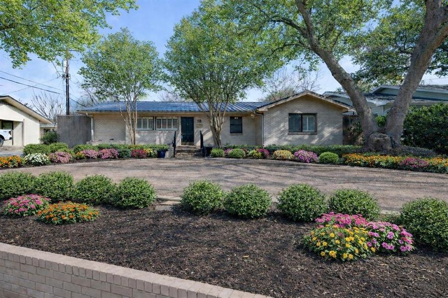 Step into this beautifully updated home ideally located in the heart of the cultural district, just moments from the country club, top-rated restaurants, museums, and premier event venues. Designed for both everyday comfort and entertaining, the home features two spacious living areas filled with natural light and flexible living options. The fully renovated kitchen is a standout, showcasing sleek quartz countertops, modern finishes, and thoughtful updates that blend style with function. All bathrooms have been completely remodeled, offering a fresh, contemporary feel throughout. A durable metal roof adds long-term value and peace of mind. Outdoor living shines with two enclosed patios-garden areas, perfect for relaxing, gardening, or hosting guests year-round. The mother-in-law suite provides excellent flexibility for multigenerational living, guests, or a private home office. The property also includes a rear parking pad, with estimates available to construct a garage on this space—an exceptional opportunity to add future value. With its unbeatable location, extensive renovations, and versatile layout, this home is a rare find in one of the city’s most sought-after neighborhoods. NOTE: VIRTUAL STAGING HAS BEEN USED FOR SOME ROOMS. IN THOSE CASES FURNISHING SHOWN ARE NOT PRESENT IN THE HOME AND ARE NOT OWNED BY THE SELLER; Plumbing has been updated.