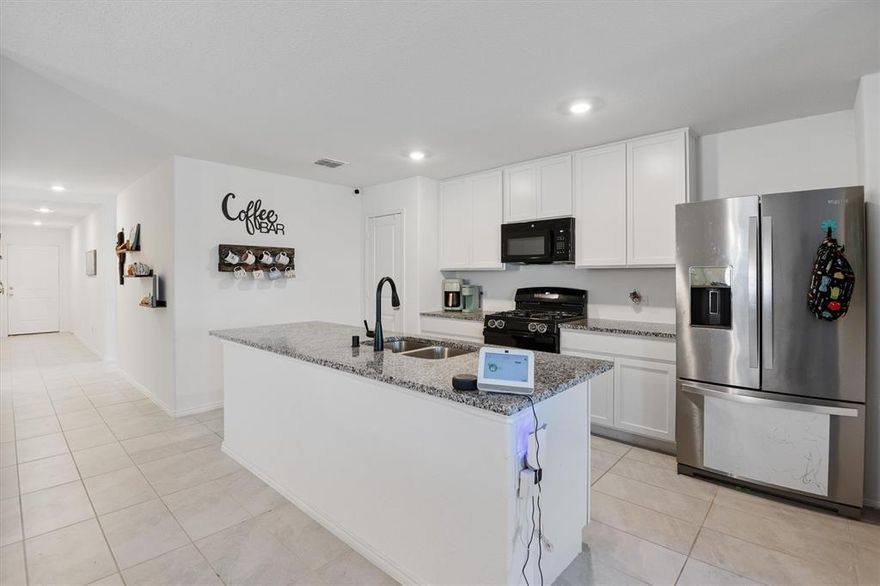 Welcome home to this beautifully maintained 4-bedroom, 2-bath stunner in the highly loved Shale Creek community—where you get all the perks of new construction without the wait, the dust, or the punch lists. This home feels better than new from the moment you step inside.
Qualifies for ZERO DOWN USDA Rural Development financing

The open-concept layout is bright and inviting, offering an expansive living area that effortlessly connects to a gorgeous island kitchen with abundant cabinetry, stainless appliances, and plenty of room for gathering, cooking, and everyday living. Cook while watching the kids play or watch TV and keep a great conversation going from the living room to the kitchen.

The private primary suite delivers a peaceful retreat with a large walk-in closet and a spacious bath. Three additional bedrooms provide flexibility for guests, an office, playroom, or whatever fits your world.

Step outside to a fully fenced backyard perfect for kids, pets, or a future patio extension. There’s space to truly live here. Great storage building built on the back side of this home to store toys, tools or lawn equipment.

Located in the quiet and established Shale Creek community, this home offers the comfort, space, and value buyers are searching for. Move-in ready, wonderfully maintained, and without the premium price tag of new builds—this one is a must-see.