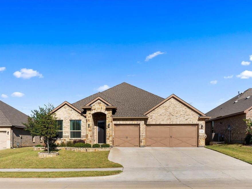 Welcome to this beautiful, hardly lived in home built in 2021 zoned for Mansfield ISD! This home has just about every upgrade the builder was offering and you don't want to miss out! This split floor plan is ideal with two bedrooms and a full bathroom at the front of the home with an additional bedroom plus half bath and spacious primary bedroom at the back of the home. The living room seamlessly transitions into a magnificent kitchen, featuring granite countertops, a spacious island, and sleek stainless steel appliances. The oversized island is perfect for entertaining for everyone to gather around and when you step outside into the backyard it is quiet and serene with plenty of space to enjoy. The front and backyard grass have also been immaculately maintained and is ready for a new owner. The 3 car garage is ideal for all of your storage needs and comfortably fits mid size SUVs. Conveniently located near major highways, shopping destinations, entertainment venues, and parks.