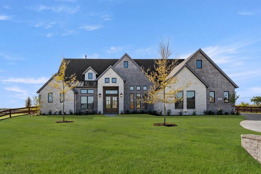 MLS# 21049963 - Built by Kindred Homes - Ready Now! ~ Discover this stunning new construction one story, single-family residence on a cul-de-sac in The Highlands of Northlake, set for completion in October, 2025. Spanning 3,640 square feet, this traditional home features 4 spacious bedrooms, each with its own bathroom, ensuring comfort and privacy. The open floor-plan includes two living areas, a dining area, and a gourmet chef's kitchen equipped with a kitchen island, with upgraded stainless steel appliances including a 48 range, double oven, built-in wine cooler, and expansive pantry.  Enjoy the elegance of two fireplaces, one in the family room and an outdoor option for alfresco gatherings. The property boasts luxurious finishes such as nail down white oak hardwood, quartz countertops, upgraded ceramic tile, and high traffic quality carpeted floors. Additional highlights include an in-law suite layout, walk-in closets, and a covered patio with an outdoor kitchen and attached grill, perfect for entertaining. Energy efficiency is top of the mind in this build with tankless water heater, Zip Board sheathing, fully encapsulated foam insulation, natural gas Bosch HVAC, and energy efficient windows. With a 4-car garage for car enthusiasts, and located in the highly regarded Northwest ISD, this home is an exceptional opportunity.