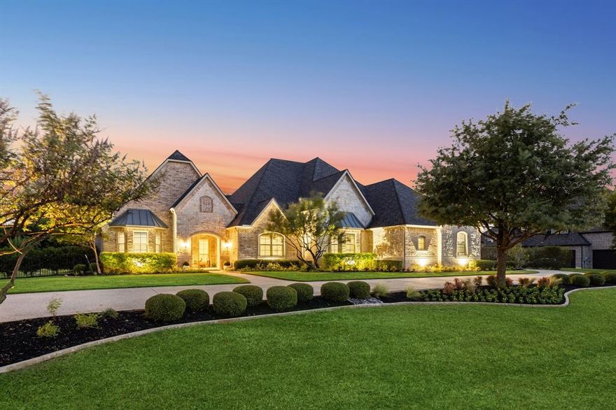 Located in a gated estate community, this home welcomes you with a circular driveway leading to the courtyard that provides entrances to both the main home and the casita.

You enter into the dining room with views of the pool, then step into the living room with hand-scraped wood floors, a coffered beamed ceiling, a fire glass fireplace, and large windows that frame the backyard oasis. The chef’s kitchen is designed for entertaining, featuring Wolf appliances, a 6-burner range with a wall-mounted faucet for filling large pots, double ovens, and a custom walk-in pantry. Just off the kitchen, the breakfast room offers two wine coolers, a coffee bar with built-ins, and casual dining with a view.

The owner’s suite is a private retreat with a seating area and pool views. The spa-inspired bath includes separate vanities, a soaking tub, and a walk-in shower, while dual closets are tucked away in a private dressing area.

All of the bedrooms are generously sized, each offering the privacy of an ensuite bath.

The den is tucked away for cozy evenings, with pocket doors that close over the windows for dark movie viewing or open to enjoy natural light and game nights. A private office with built-in bookshelves provides the perfect work-from-home setting.

The home flows seamlessly outdoors to two covered living spaces overlooking the 10-foot deep pool, raised sunning deck, and firepit. An outdoor kitchen with granite bar seating completes the resort-style setting. The backyard offers multiple spaces for dining, lounging, and play, all surrounded by lush landscaping.

The private casita offers a living room, vaulted beamed ceiling in the bedroom, bath, laundry, and separate entrance—ideal for guests or extended family. A 3-car garage plus an additional 1-car garage with staircase to attic storage access provide excellent additional storage. This exclusive gated neighborhood offers privacy while remaining close to shopping, dining, and top schools.