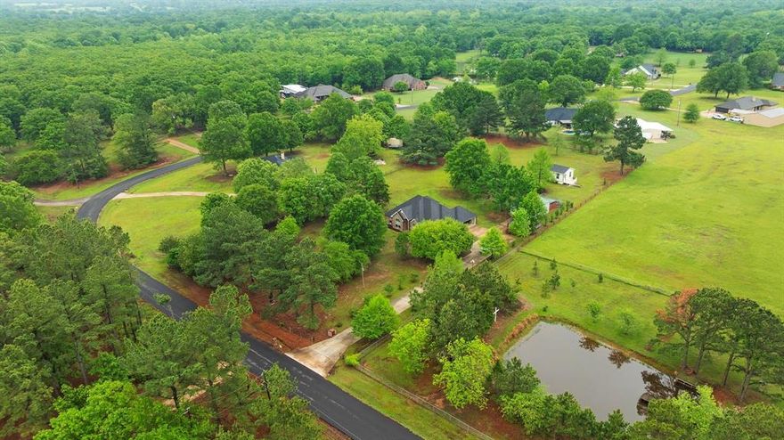 Spacious Home + Guest House + Shop + gazebo + split rail fencing and dog pen on 2 Acres in Rolling Acres Addition
This is what you’ve been waiting for in the highly sought-after Rolling Acres Addition! Nestled on 2 peaceful acres, this property offers the perfect blend of space, comfort, and versatility.
The main residence features 1,733 square feet of living space with 3 bedrooms and 2 full bathrooms. Inside, you’ll love the vaulted ceilings, open-concept layout, and generously sized bedrooms that create a bright and inviting atmosphere. A cozy propane fireplace adds warmth and charm to the living area, making it perfect for relaxing or entertaining.
In addition to the main home, the property includes a 676-square-foot guest house (accessory dwelling unit) complete with 1 bedroom and 1 full bathroom—ideal for guests, extended family, or potential rental income.
Step outside to enjoy the serene surroundings, complete with a gazebo for outdoor gatherings, a shop with electricity and a single bay door for projects or storage, and wide-open views that provide a true sense of country living within minutes of town.
Located in North Lamar ISD, this property combines tranquility with convenience. Opportunities like this don’t come around often—schedule your showing today!
