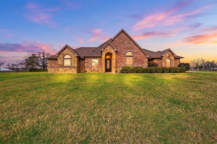 Situated on 2 acres with no restrictions, this exceptional property offers space, privacy, and thoughtful design while still being conveniently close to city amenities. A standout feature of the property is the 4,000 sq ft shop complete with a dedicated office, abundant storage, and an attached newly constructed two-bedroom apartment. Full covered RV hookups and pad for RV up to 50 ft long. Shop also has 3 phase power available. The apartment showcases granite countertops, stainless steel appliance and luxury vinyl plank flooring throughout, creating a clean, modern living space that feels both comfortable and stylish. Inside the main home, attention to detail and quality finishes are evident from the moment you enter. Hardwood flooring flows throughout the main living areas and hallways, creating warmth and home is flooded with natural light, creating a welcoming feel. The kitchen is beautifully appointed and designed for both everyday living and entertaining, featuring a gas cooktop, stainless steel appliances, ample cabinetry, and a butler’s pantry that adds extra prep and storage space. The primary suite offers a private retreat with a cozy gas log fireplace and direct access to the back porch for quiet mornings or relaxing evenings. The ensuite bathroom is spacious and inviting, complete with separate vanities, an oversized walk-in shower, and a deep garden soaking tub, along with a generous walk-in closet. Outdoors, the backyard is designed for both relaxation and gathering. A sparkling pool with attached spa creates the perfect place to unwind, while the covered back porch provides plenty of room for seating and outdoor cooking. With plenty of open yard space remaining, there is room to expand, garden, play or simply enjoy the wide open surroundings. This property combines the feel of country living with the convenience of nearby shopping, dining and everyday necessities.