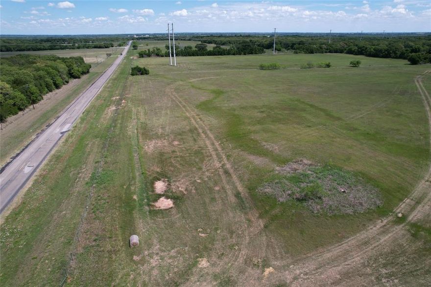 This 67.554-acre tract is located just south of Aquilla, TX, with paved road frontage and a water meter already in place—features that are becoming harder to find in the area. The property is fully fenced and cross-fenced and includes four established hay meadows, making it well-suited for grazing or hay production. A timberline runs across the tract, providing natural separation, shade, and habitat for wildlife. Several suitable homesite locations are available throughout the property, offering both privacy and views of the surrounding landscape. Wildlife is present, including deer that have been observed on the property. A stock tank near the front provides a reliable water source for livestock and wildlife. Exempt property taxes are $118 per year. Seller is a licensed Texas attorney. Seller’s spouse is a licensed Texas real estate agent.