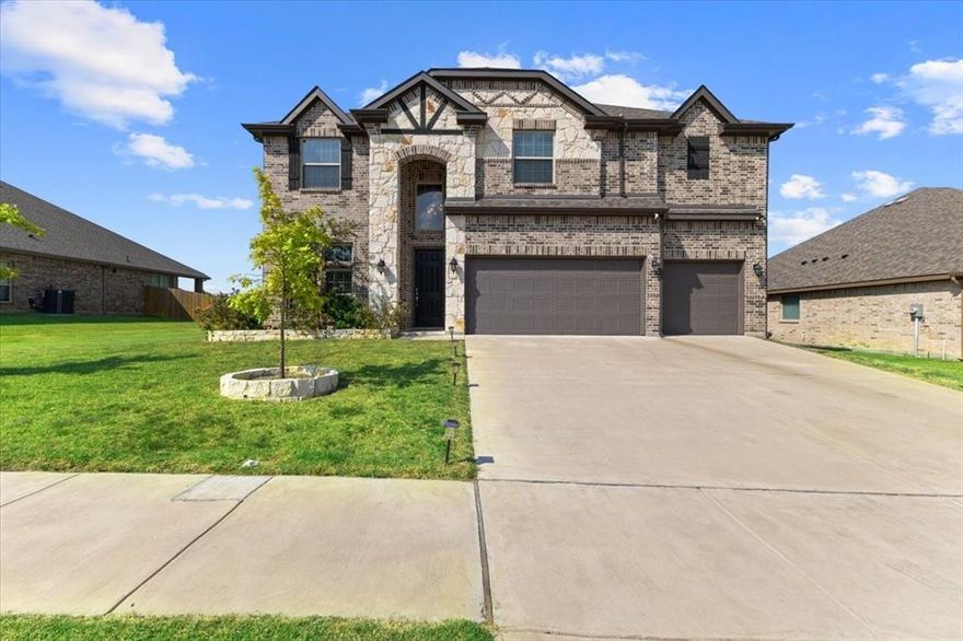 625 Alaina Drive, DeSoto, Texas 75115

Built in 2023, this exceptional 5-bedroom, 4-bathroom home offers nearly 3,700 sq. ft. of thoughtfully designed modern living on a generous 0.25-acre lot, complete with a spacious 3-car garage. From the moment you step inside, you’ll be captivated by soaring ceilings, abundant natural light, and an open-concept layout that seamlessly connects living, dining, and kitchen spaces.

The chef’s kitchen is a true centerpiece, featuring stainless steel appliances, a large center island, and a walk-in pantry, perfect for preparing gourmet meals and entertaining family and friends. The luxurious primary suite offers a serene retreat with a spa-style bathroom, dual vanities, a soaking tub, and an expansive walk-in closet.

Upstairs, a versatile media room and game room provide the ideal space for entertainment, movie nights, or a home office. Step outside to the covered patio and enjoy peaceful mornings or relaxing evenings overlooking the oversized fenced backyard, offering plenty of space for outdoor activities and gatherings.

Perfectly located in a highly desirable DeSoto neighborhood, this home is just minutes from new developments, parks, shopping, and dining, with easy access to Downtown Dallas—only a 15-minute drive away. Combining modern luxury, functional design, and a prime location, 625 Alaina Drive is a must-see for families seeking comfort, style, and convenience.