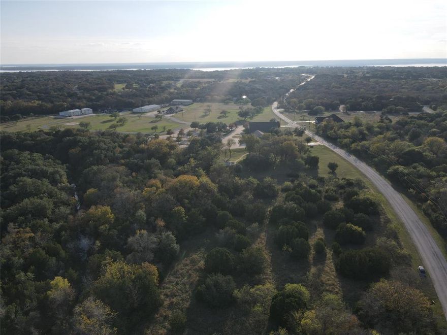 Great one acre lot in White Bluff! White Bluff is a resort community that has community pools, two golf courses, a marina, and resort accommodations. Front gate guard will only all people that are accompanied by a real estate agent.