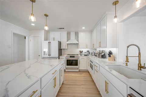 Photo of 2309 Homestead Place, Garland, TX 75044 (MLS # 21174680)