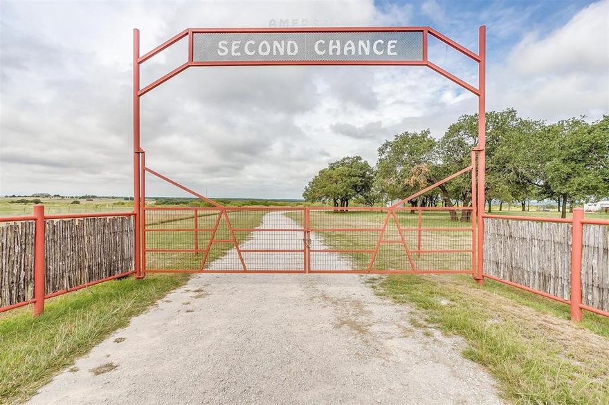 GORGEOUS PARKER COUNTY RANCH WITH CUSTOM RANCH STYLE HOME OVERLOOKING 147 ACRES OF PRISTINE RANCH LAND WITH ALMOST 1 MILE OF PAVED ROAD FRONTAGE! This ranch offers a beautiful metal structured ranch house with wrap around porches on a hilltop nestled among numerous mature oaks with gorgeous 360 degree views! The main ranch house is situated next a 60 x 40 shop with an additional fully contained living quarters, tack room and feed room. The shop offers a pull through bay and lean too's off both sides for equipment parking and livestock shelter. The ranch is fenced and cross fenced and offers road frontage on 2 sides, 4 ponds stocked with fish, 2 sets cattle working pens, hot house, variety of post and live oaks, 6000 gallons of water storage and a very strong water well, a windmill, deer stands, and abundance of wildlife. Bring the livestock and horses and enjoy the beauty this ranch has to offer in a great location within just a short drive to Weatherford, Mineral Wells and Fort Worth!
