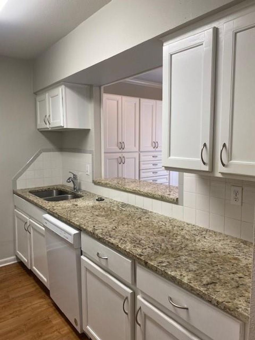 Updated 2BR and 1 and half BA Condo – Prime Location! Beautifully updated condo with granite countertops in kitchen and bath, hardwood floors, fresh paint, and tons of natural light. Includes washer and dryer, all kitchen appliances, and ample storage. Enjoy a large fenced patio, convenient assigned covered parking, and location near the office and pool. HOA covers water, trash, pool, grounds & facility maintenance. Move-in ready!