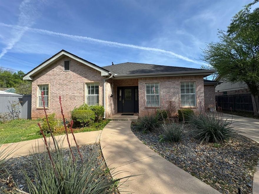 Classy Two-Bedroom, Three-Bath Garden Home in a serene Southside setting. This beautifully designed garden home features a split bedroom layout and offers both formal and casual dining options. Highlights include plantation shutters, a cozy fireplace, and a rear-entry garage. This custom-built home boasts numerous extras, including a spacious kitchen with an island.
