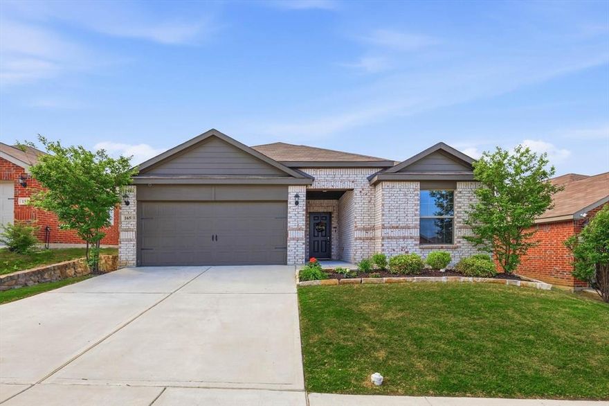 **Assumable FHA loan at 4.375%** Step into a home that feels elevated from the moment you arrive. Built in 2021 and meticulously maintained by its original owner, this 4-bedroom, 2-bath single-story residence blends modern design with thoughtful, high-end upgrades throughout. The interior showcases a clean, refined aesthetic with fresh paint and upgraded trim work, including substantial 1x6 baseboards and 1x4 door casings that add a custom, polished finish to every room. Wood-look tile flows seamlessly through the main living areas, offering both durability and a sophisticated, cohesive look. Designed for both everyday living and effortless entertaining, the open-concept layout connects the kitchen, dining, and living spaces in a way that feels both functional and inviting. The primary suite serves as a true retreat, highlighted by a sleek frameless glass shower that brings a spa-like feel to the space and 2 primary closets. Thoughtful enhancements continue with added cabinetry in the laundry room for elevated storage, along with built-in cabinets and a dedicated workbench in the garage which perfectly blends practicality with organization. In the back yard, the extended 25’ x 12’ patio creates an ideal setting for entertaining or relaxing, while the front yard boasts of upgraded flower beds with a chopped stone border adding a refined touch to the home’s curb appeal.
Located in the desirable neighborhood of Chisholm Springs, featuring a neighborhood pool, parks, basketball court, gym, and community center, this home offers a lifestyle of comfort, convenience, and understated upgrades—all in a beautifully curated, move-in ready package. Welcome home to 165 Bandana Circle!