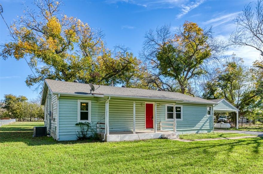 FOR SALE! 4 bedroom, 2 bath home on 1 ACRE! Fully fenced with automatic gate and 2-car carport. Updates include: energy-efficient windows, gutters, water softener system, granite countertops, built-in microwave. Well pressure tank and booster pump were both replaced July 2024. HVAC replaced 2017. Northwest ISD.