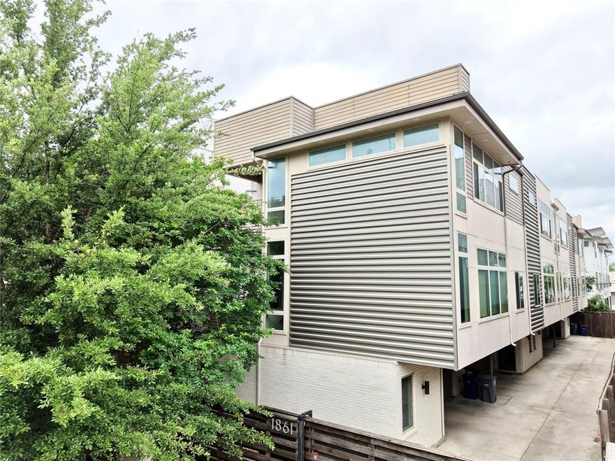 Welcome to 1861 Summit Ave, Unit 2, a sophisticated and highly versatile condo in the heart of Lower Greenville. With 2 bedrooms, 3 full baths, and 2 additional bonus spaces, this residence offers a rare blend of style, function, and flexibility in one of Dallas’ most walkable urban settings, where dining, shopping, nightlife, and everyday conveniences are just outside your door.

The ground floor features beautifully stained concrete floors, a generously sized laundry room, access to a private fenced backyard with turf and a paved patio, and an oversized garage. On the main living level, rich wood floors, walls of windows, and an open-concept layout create an airy, light-filled space that is equally suited for entertaining and everyday living. The kitchen is both striking and functional, complete with a Bertazzoni gas range, modern finishes, and generous space for gathering. A bonus room adjacent to a full bath on this level adds exceptional flexibility and can easily serve as a guest room, home office, or workout space.

Upstairs, the third floor is anchored by a spacious primary suite with a beautifully appointed bath featuring high-end finishes, a jetted tub, separate walk-in shower, dual sink vanity, and a large walk-in closet. A second bedroom with its own ensuite bath, along with an additional bonus room ideal for a nursery or office, completes the upper level.

Located within walking distance of Lower Greenville Avenue and Henderson Avenue, and just minutes from downtown Dallas, this home delivers a low-maintenance lifestyle with the space and versatility rarely found in an urban location.