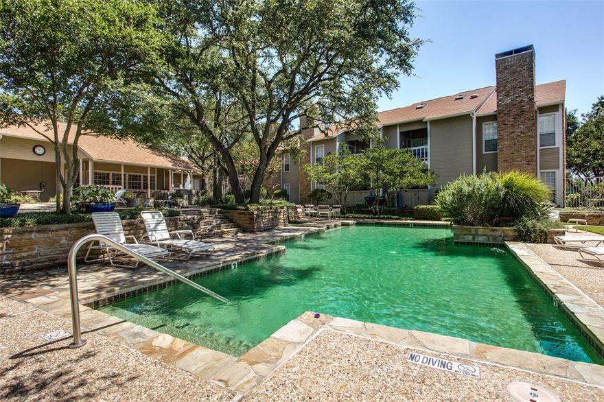FHA and VA approved complex in Lake Highlands and zoned to Richardson ISD, this second story, 2 bedroom, 1 bathroom condo near White Rock Creek features vaulted ceilings, abundant natural light throughout and NO CARPET. Cozy living room with wood-burning fireplace. Updated kitchen with quartz countertops, stainless steel appliances, subway tile backsplash, and a breakfast bar overlooks the breakfast room. Two generously sized bedrooms share an updated bathroom. The oversized balcony overlooks the multi-level pool, mature trees, and lush landscaping. HOA dues include full use of facilities, exterior maintenance of the structure, water, sewer, and covered parking. Convenient access to major roadways, grocery stores, restaurants, coffee shops, Lake Highlands Town Center, White Rock Lake, the Richardson Telecom Corridor, and approximately 20 minutes from downtown Dallas, the Arts District, and major medical and employment centers. This one is a MUST SEE!
