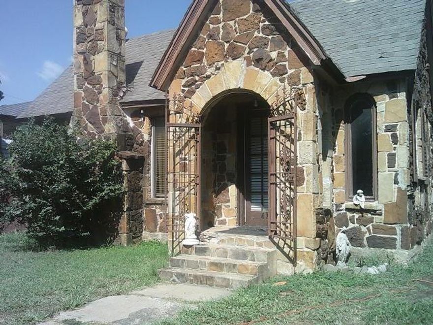 There’s a special kind of energy in Fort Worth’s Northside neighborhood these days. Once known solely for its storied Stockyards and historic homes, the area is now in the midst of an exciting transformation. Investors and homebuyers alike are taking notice, drawn by the promise of growth and the undeniable charm of this vibrant community.
What makes Northside such a hot spot? It’s the perfect blend of old and new. You’re just minutes from downtown Fort Worth, surrounded by rich Texas history, and right in the heart of a neighborhood that’s buzzing with redevelopment. The streets are lined with homes that tell stories—some lovingly preserved, others waiting for someone to unlock their full potential.
Take, for example, this classic rock house perfectly sits on a corner lot within blocks of Main Street. With its expansive layout, this home offers a large living area complete with a cozy fireplace—perfect for gatherings on cool Texas evenings. The dining area flows seamlessly into an open kitchen featuring plenty of cabinets, granite countertops, and a spacious island ideal for meal prep or casual breakfasts.
Upstairs and down, you’ll find four generous bedrooms and two baths, including a primary suite on the main floor for added convenience. Upstairs, three more bedrooms provide plenty of space for family, guests, or even a home office. And speaking of versatility, there’s a garage apartment that could serve as a private workspace or a rental unit, offering extra income potential. While the home needs a bit of TLC, that’s exactly what makes it such an intriguing investment. Imagine putting your personal stamp on a property with great bones, in a neighborhood with so much upside. Whether you’re looking to renovate and resell, create your dream home, or generate rental income, the possibilities are wide open. 
In Northside, opportunity knocks for those with vision and a love for history. Don’t miss your chance to be part of this neighborhood’s next chapter!