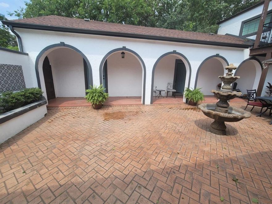 Charming 1 bedroom, 1 bath unit in a Spanish style triplex full of character and timeless appeal. This unique home features classic architectural details, built-ins, and finishes that create a cozy and inviting atmosphere. Enjoy the serene courtyard with a beautiful central fountain, perfect for relaxing outdoors. A rare find with charm and a peaceful setting, this home offers both style and comfort in a truly special space.