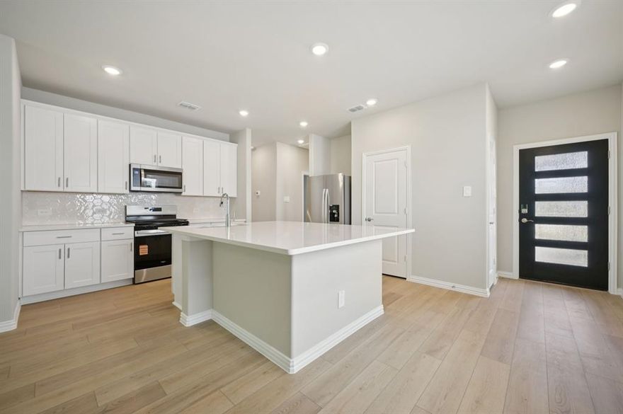 BRAND NEW energy - efficient home Mar 2026! Enjoy family dinners around the kitchen island in the Sequoia's convenient eat-in kitchen. White cabinets with veined white quartz countertops, tan tone EVP flooring and light grey brown textured carpet. Lakehaven is a master-planned community located at the edge of Lavon Lake, featuring all of the modern amenities. Family time will turn into lake time during the warm Texas summers. The Spring Series will boast six floorplans from our National Park Collection that range in size from approximately 1,270 sq. ft. to 2,255 sq. ft. Each of our homes is built with innovative, energy-efficient features designed to help you enjoy more savings, better health, real comfort and peace of mind.