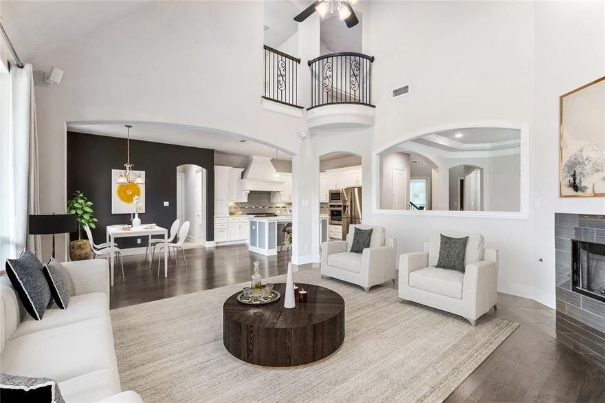 CASTLE HILLS, TWO BEDROOMS DOWN PLUS OFFICE, TWO-STORY FAMILY ROOM, LARGE BACKYARD, 3 CAR GARAGE, ELECTRIC GATE. Experience elevated living in Castle Hills with this stunning, thoughtfully designed home featuring the primary suite, additional bedroom, plus a main-level office and a three-car garage. From the moment you step into the soaring two-story entry, rich hardwood floors and an open-concept layout create a sense of elegance and space. The chef’s kitchen is a showpiece, boasting quartz countertops, under-cabinet lighting, glass-accent cabinetry, pots-and-pan drawers, stainless steel appliances, a vented hood, and a 6-burner gas cooktop. Flowing seamlessly to the formal dining area and dramatic two-story family room, it’s perfect for entertaining and daily living alike. The primary suite is a serene retreat with vaulted ceilings, a sitting area, and a spa-inspired bath featuring comfort-height dual vanities, quartz counters, a seamless shower, and a separate soaking tub. Secondary bathrooms showcase granite countertops, while upstairs, three additional bedrooms, a game room with bar area, and a media room with 7.1 surround sound provide versatile space for family and guests. Outdoor living is exceptional, with a spacious backyard accessed through an electric gate, an outdoor kitchen, and a 28’x11’ covered porch—ideal for gatherings or quiet relaxation. A mudroom adjoins the oversized laundry, and epoxy-coated garage floors and numerous custom finishes add polish throughout. Refrigerator available with acceptable offer. Castle Hills offers world-class amenities, including an 18-hole golf course, pools, parks, walking trails, and more—combining luxury, recreation, and convenience in one of the area’s most desirable communities.