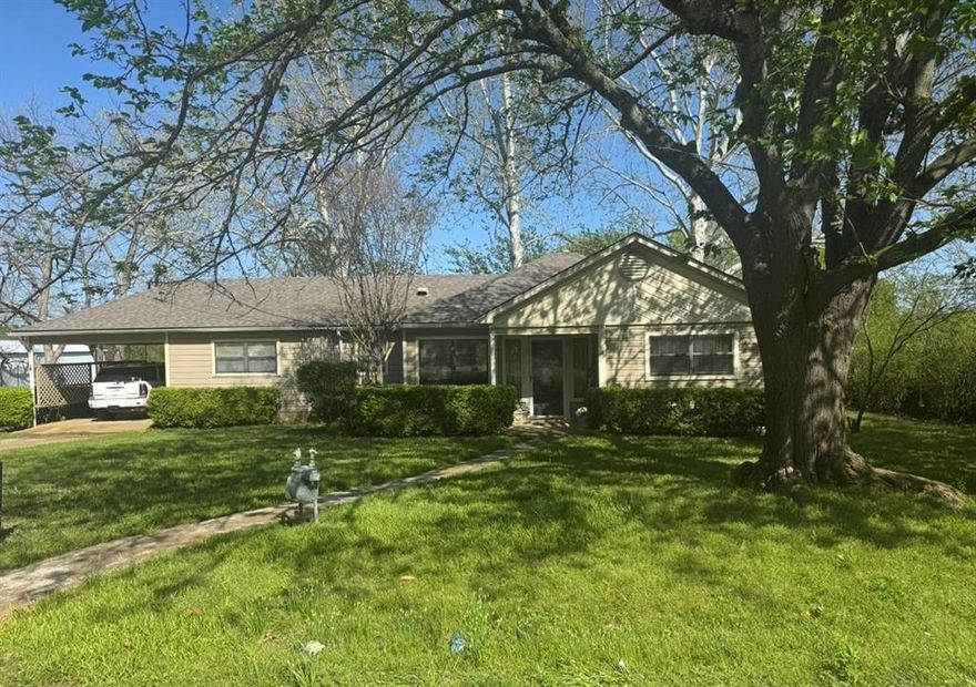 Cute 3bedroom, 2bath home in Bells, Texas, boasts fantastic curb appeal and is situated on almost half-acre lot. This property is perfect for those seeking a cozy home with character and special touches throughout.  Updates in 2020 include granite counters, tiled back splash, stainless steel appliances , water heater and original hardwood floors refinished. Spacious open living and dining area. Primary bedroom features en-suite bath and ample closet space. Seperate laundry room. Split bedroom arrangement. Sunroom.  A welcoming front yard and charming exterior make a wonderful first impression. Park like backyard.  20x25 shop with electricity and sheShed with electricity.   Small town charm and friendly community within Bells ISD makes this property even more desirable. Don’t miss your chance to own a property that offers space, style, and potential. Schedule your showing today!