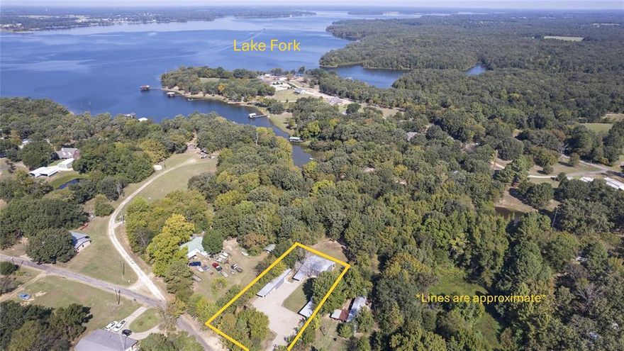 Unique opportunity in Paradise Cove! This property features two metal cabins plus an extra building on a quiet cul-de-sac with no known restrictions. The first cabin offers 2 bedrooms, 1 bath, a one-car attached garage with loft storage, metal carport, and covered back patio overlooking trees and a deer feeder. The second cabin includes 1 bedroom, 1 bath, kitchenette, storage space, and a covered awning perfect for extended parking or boat storage. An additional metal building and awning provide more parking, storage, or the option to convert into a third cabin. The property is 0.58 deeded acres with leaseback with some access to Lake Fork (not enough for boat access).  Currently used as a successful short-term rental, this property is ideal for investment, multi-family living, or weekend getaways. With an acceptable offer, furniture and appliances can convey, making it turnkey ready. Enjoy peace and privacy on a dead-end street while staying close to lake amenities and area conveniences.