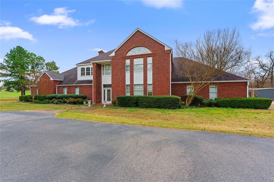 The Campbell Estate Ranch nestled in the picturesque Northern Lamar County boasts an impressive spread of approximately 139 acres of prime land bordering Pat Mayse Lake WMA. Anchored by a grand 5,172 square foot residence, this estate is a testament to the epitome of country living. As you traverse the rolling pastures, you'll encounter well-established amenities including an equipment shop, pens, and barns designed to facilitate various agricultural activities. The landscape is decorated with multiple ponds and a majestic 3-acre lake that serves as a serene centerpiece. The property's fertile sandy loam soil sets the stage for flourishing grasslands and agricultural endeavors making it an ideal for cattle, horse, or hay production. Estates of such caliber are a rarity, and opportunities to acquire them are few and far between. For those with a discerning eye for quality and a penchant for the rustic charm of country living, the Campbell Estate Ranch stands as an unparalleled offering.