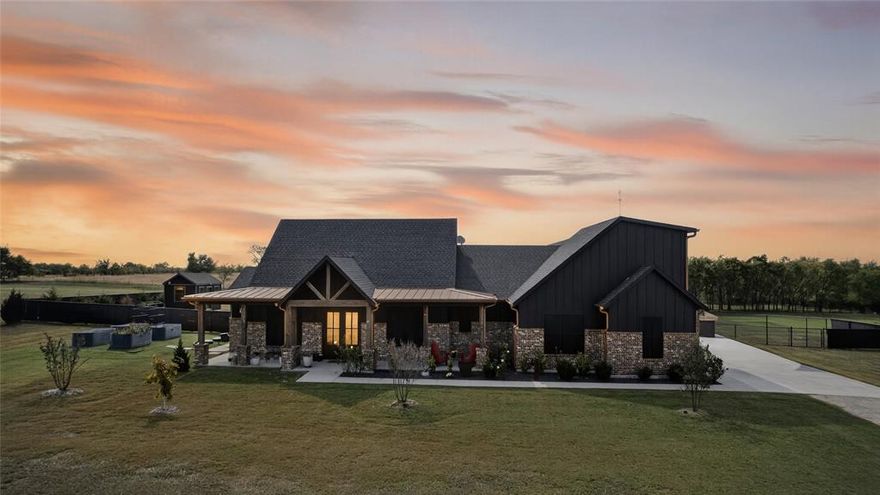 Welcome to this stunning Custom Modern Farmhouse by Villa May Construction, where timeless design meets the tranquility of country living.  It's a home that feels custom and is designed for you to appreciate the peaceful rhythm of country life.  Situated near the end of a cul-de-sac, and on acreage that backs to a private ranch, this home offers uninterrupted views, open skies, and the serenity of nature - all without sacrificing modern luxury.  Step inside to find an open-concept floor plan designed for both everyday living and effortless entertaining.  The main level features three spacious bedrooms, two and a half baths, a dedicated office with built-in display shelving, and a mudroom complete with a dog wash station!  The great room features  a vaulted ceiling with exposed beams and fireplace that is also open to the patio.  You'll also appreciate custom barn doors, and designer wall accents that create a warm, inviting atmosphere. The kitchen is a dream come true with an expansive island, built-in serving bar with wine refrigerator, and a hidden walk-in pantry offering abundant storage for your larger kitchen essentials.  The Primary Suite is a peaceful retreat showcasing backyard views, a spa-inspired bath with a massive walk-in shower built for two, a soaking tub, and a large walk-in closet designed to impress when you dress!  Upstairs, a spacious media or flex room is ideal for movie nights, a home gym, hobby studio, or guest retreat.  The year round enclosed back patio with solar screens and fireplace is the perfect setting for coffee in the morning or a cocktail at night to enjoy watching the sunset and you get a brand new in-ground pool and spa!  Every detail of this home was crafted to capture light, space, and style - from the bright, airy interiors to the premium finishes throughout.   Home is equipped with an EV-Charger and connection for a generator.  Come see this one-of-a-kind property and discover where modern living meets country charm!