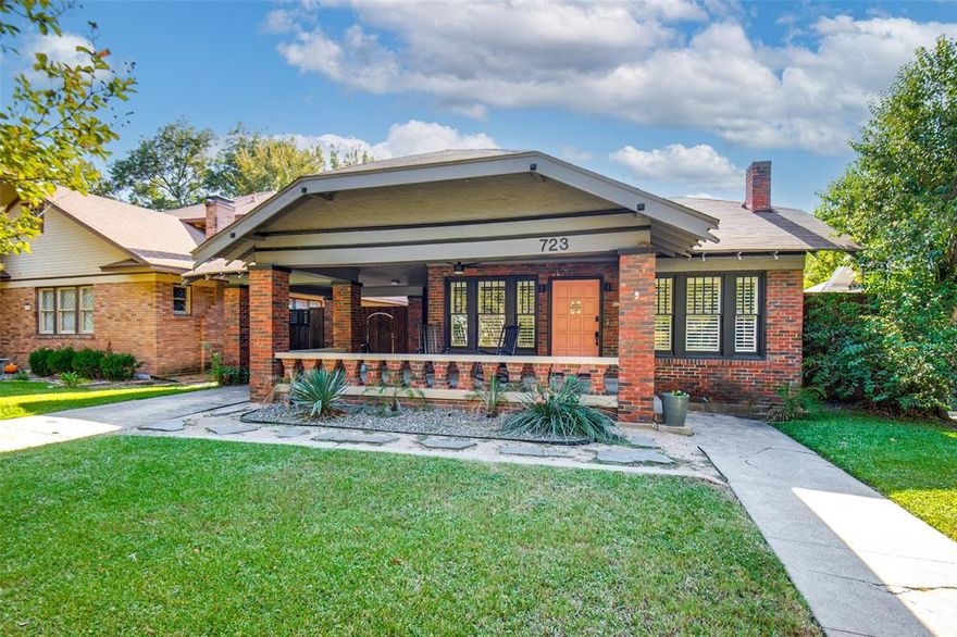 Welcome to 723 Skillman Street! A beautifully restored craftsman in the heart of Junius Heights that balances historic charm with modern livability. Featuring 4 bedrooms and 3 bathrooms, this thoughtfully renovated home offers warm hardwood floors, tall ceilings, an open-concept kitchen with quartz countertops, stainless appliances, and custom cabinetry. The spacious upstairs primary suite includes a spa-style bath and walk-in closet, while the main level provides flexible living and office space. Step outside to your own backyard oasis with a sparkling pool, turf lawn, patio, and fire pit area ideal for entertaining or relaxing. A detached garage has been converted into a versatile flex space and could easily be returned to a traditional garage. Above it, a 1-bedroom, 1-bath apartment with private entrance provides excellent guest, rental, or studio potential (not included in total square footage and rented for $800 per month). A front porte cochere adds convenience and additional covered parking. Located on a quiet, tree-lined street within walking distance to Lakewood, Lower Greenville, and Lipscomb Elementary, this is East Dallas living at its best.