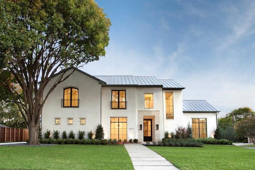 Welcome to over 6,000 SQFT of living, architectural features to include black windows, metal roof and designer touches, gas lanterns. An abundance of natural light, huge windows throughout, dining room, wood floors throughout the main living areas & master, study. Living room with cast stone fireplace, all open to the kitchen with stainless steel appliances, Subzero built in fridge, Wolf range with six burner gas cooktop, warming drawer, built in microwave, two dishwashers, farmhouse sink, breakfast nook, built in wet bar, temperature controlled wine room, open floor plan, 5 bedrooms including the ensuite master retreat, double frameless shower, separate vanities, free standing tub, walk in custom his and hers closet, downstairs guest room with ensuite and walk in closet, upstairs you will 3 more bedrooms with walk in closets and en suites, game room. Step outside and you will enjoy screened in patio with cast stone fireplace, sparking pool with water features and tanning ledge.