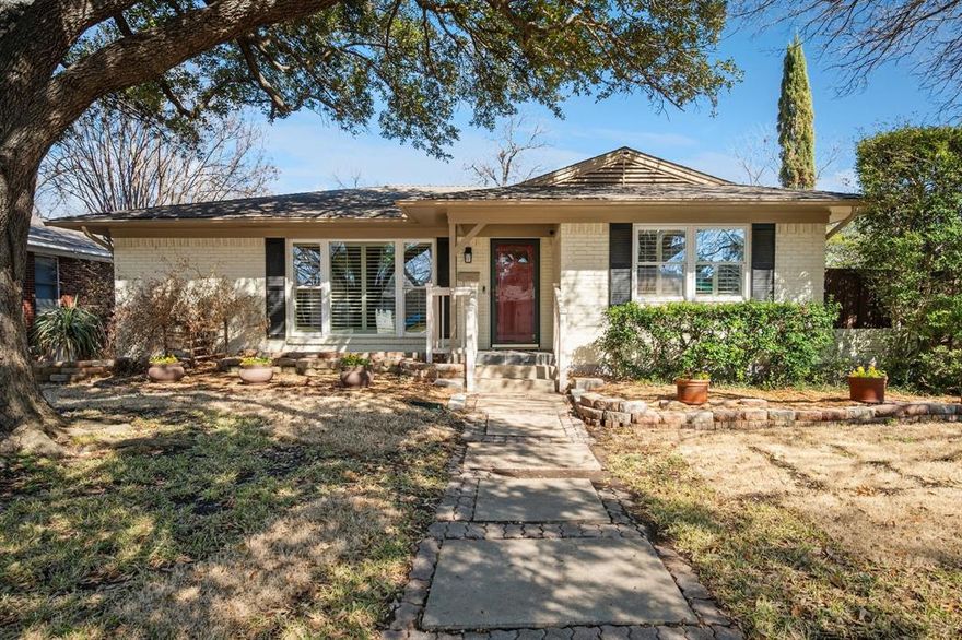 Charming and spacious 3 bedroom home perfectly positioned minutes from White Rock Lake! Nestled on a roomy corner lot, this home welcomes you with mature shade trees and beautiful landscaping. Step inside to find rich hardwood floors, warm neutral tones, and two distinct living areas permeating with natural light. The home boasts a chef’s kitchen featuring granite counters, a gas cooktop, and timeless cabinetry. It flows effortlessly into the dining and secondary living space, where custom built-ins and sleek sliding glass doors create an inviting atmosphere to the outdoors. Retreat to the primary bedroom with its private en suite, or utilize the oversized guest room as a bright, quiet home office. Additional updates include HVAC replacement (2018), dining and 2nd living area tile floors (2018), double pane windows and plantation shutters. Outdoor living shines here with a durable ipe wood deck, covered by a custom pergola - perfect for tranquil mornings or festive weekend gatherings alike. Put your walking shoes on and enjoy this homes close access to White Rock Lake and Ridgewood Belcher Rec Center. Flag Pole Hill Park, The Dallas Arboretum, and various shops all just minutes away. If you value friendly neighbors, walkability, and a well-cared for home, look no further!