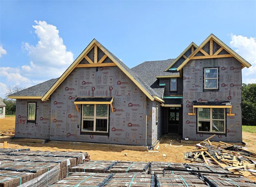 New Astoria Homes build on cul de sac acre lot. 6 car Super Stall with one garage door extra wide & 9ft tall for that awesome truck you can’t fit in your current garage or the family boat. Real hand scraped hardwood oak floors, not that clippity clop stuff you get over charged for.  “Wash Happy” oversized shower in master bath. Double oven with microwave, wood range hood, quartz counter tops in kitchen and all bathrooms. Pure White maple cabinets, beautiful backsplash , venetian bronze hardware, faucets & fixtures and 5.25 baseboard. Garage is finished with insulated garage door and opener. Deluxe package Epoxy floors in garage. Sod, sprinkler, landscaped package and full gutters.