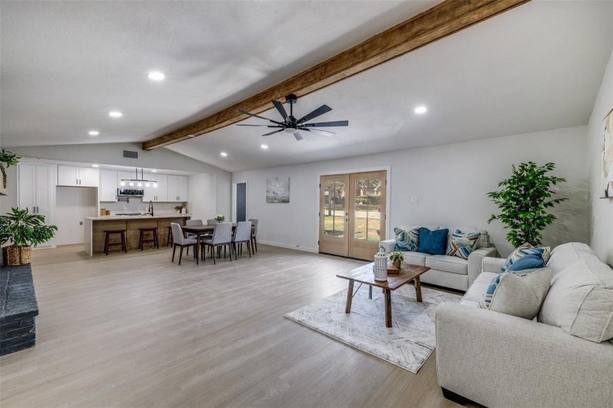 Welcome to this beautifully updated 5-bedroom, 3-bath home with modern finishes, open space, and timeless charm. Step inside through double doors into a bright living room with vaulted ceilings, a bold wood beam, and a painted brick fireplace. Luxury vinyl plank flooring flows throughout the open layout, leading to a showpiece kitchen with white shaker cabinets, quartz countertops, a large island, and stainless-steel appliances.

The spacious primary suite features a fully remodeled bath with a walk-in shower, dual vanities, and designer touches. Secondary bedrooms are generously sized and share an updated full bath with double sinks. A convenient half bath is located off the main living area. Enjoy the versatile bonus sunroom, fresh interior and exterior paint, and a large backyard ready to customize.

SELLER IS WILLING TO INSTALL A NEW FENCE WITH A FULL-PRICE OFFER OR A STRONG OFFER CLOSE TO LIST PRICE. ASK FOR DETAILS.

Located near shopping, dining, and major highways, this move-in ready home delivers comfort, style, and convenience in prime Dallas. Ask about the lender-paid 1-0 interest rate buydown available through our preferred lender (subject to approval).