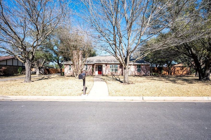 325 Bluebonnet is calling you home! SOUTH BOSQUE ELEMENTARY now and after the rezone in the fall of 2022. Surrounded by everything you could ever want; privacy, wonderful neighbors, safe and quiet. 4BR/3BA home in the desirable Harris Creek subdivision. Sitting on almost half an acre at 2,902 sq ft with beautiful, mature towering trees. The exterior has an extended driveway that features a new 50 amp hook up, an adorable side entry patio, and an oversized 2 car garage that includes a spacious storage room plus workspace. The interior features a lovely dining room, family room with raised ceilings, WBFP and beautiful wood beams, plus a large second living room. The kitchen is in the center of the home, a wonderful gathering place that boasts stainless steel appliances, granite counters, freshly painted cabinets, new hardware, an abundance of counter and cabinet space, and a work area/computer desk. The computer desk area doubles as the perfect coffee bar. Updates galore - including a new 30-year composition roof, brand new windows, new interior paint, a new 50 amp hook up, updated bathrooms, new outside up-lighting, a garden area, storage shed and new outside AC condenser! A wonderful, multi-use floor plan that has so much space to enjoy. The 4th bedroom is isolated and was previously used as an office; a very versatile floor plan! The private backyard includes an extended patio, a large yard to have a picnic under the trees and plenty of room to garden and play. The neighborhood does not have an HOA but it does have a perfect community pool that's open in the summers. What are you waiting for!?