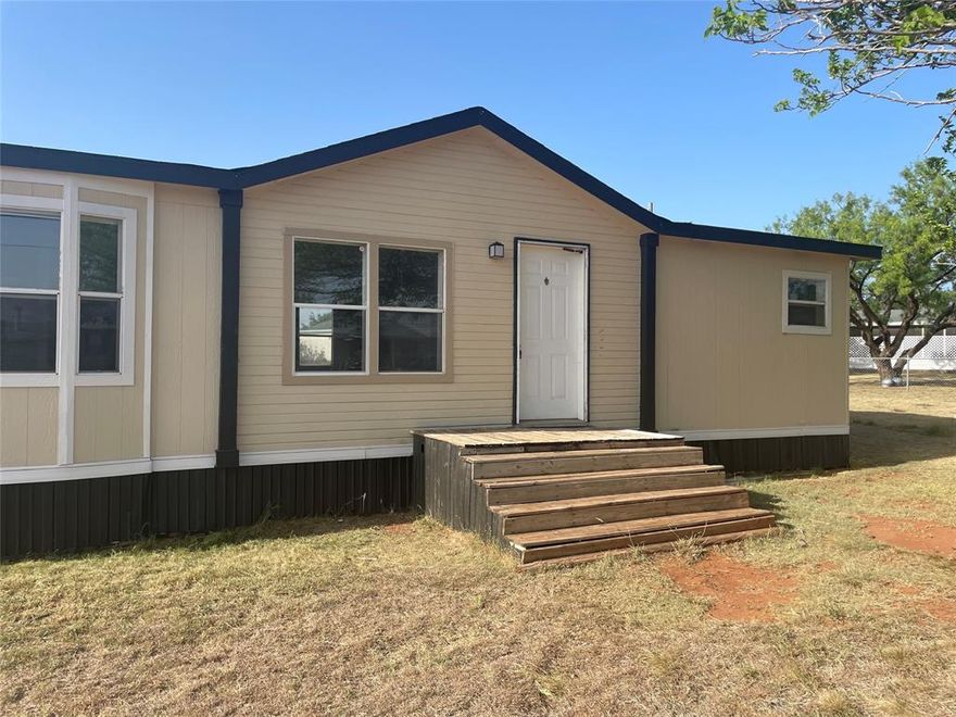 Solitaire double wide home; 3 bedrooms, 2 bath, new interior paint, newer carpet. Corner fireplace with built in shelving. Breakfast nook, electric range provided, solid oak cabinets, too. Separate utility room between back door and kitchen. Central HVAC. $40 app fee per adult; Potential tenants must tour the home before submitting an online application. Deposit due upon approval. The deposit will reserve the home for only 2 weeks before rent is due. Small dogs allowed upon owner approval and with a $350 non refundable pet fee. No cats. Call office to schedule a showing.