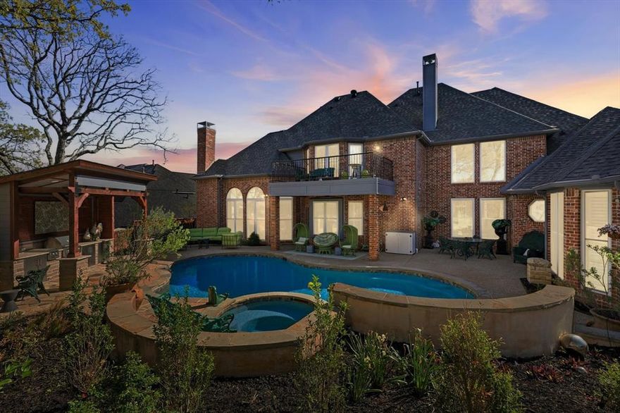 Old Hollywood Glam meets modern luxury in Highland Shores.
Situated on a prime corner lot just moments from Lake Lewisville, this just-over 5,000 sq ft showpiece offers a rare blend of bold design and everyday functionality. With 4 bedrooms, 4.5 baths, 4 living areas, and 2 dining spaces, the layout is ideal for both entertaining and comfortable living.
A dramatic two-story entry opens to light-filled interiors with rich architectural detail and a distinct, glamorous aesthetic. The updated kitchen features quartz countertops, induction cooktop, double ovens, wine fridge, and paneled Sub-Zero refrigerator. The primary suite is a true retreat with fireplace, heated floors, freestanding tub, and spa-like shower.
Step outside to a private backyard oasis with pool, covered patio, and outdoor kitchen and fireplace. Fresh updates throughout—including new carpet and interior & exterior paint—make this home move-in ready.
A one-of-a-kind opportunity for buyers seeking style, space, and personality in one of Highland Village’s most desirable communities.