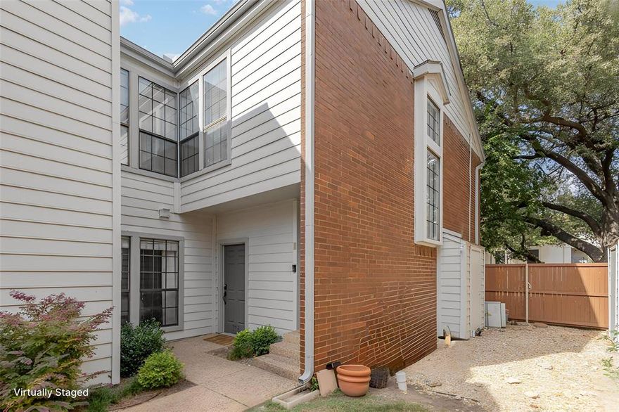 Discover this inviting 1-bedroom, 1.5-bathroom condominium nestled in the sought-after Boardwalk on the Parkway community. Built in 1982, this 985 sq ft first-floor unit offers a perfect blend of style, comfort, and practicality.

Step inside to find elegant updates, including a primary bathroom with a jetted tub, granite countertops, freshly painted cabinetry, and modern kitchen appliances. A cozy wood-burning fireplace anchors the living area, while built-in shelving, a wet bar, and abundant storage add both charm and functionality.

Enjoy outdoor living on your private fenced patio, ideal for morning coffee or evening relaxation. The home also includes a covered carport with additional storage, and residents can take advantage of a sparkling community pool and beautifully maintained grounds.

Conveniently located in North Dallas near premier shopping, dining, and major highways, this property combines low-maintenance living with comfort and convenience — a true gem in the heart of the city.