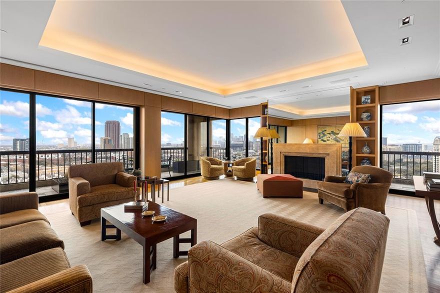 Commanding magnificent views of the downtown skyline, this exceptional penthouse is gracefully positioned in the heart of Turtle Creek. Encompassing over 4,000 square feet, the residence offers three well-proportioned terraces—providing a rare opportunity for refined indoor-outdoor living, ideal for relaxed gatherings and quiet enjoyment of the surrounding vistas.

Thoughtfully reimagined by renowned Dallas architect Bill Booziotis of Booziotis & Company, the home reflects a meticulous level of craftsmanship and design. The kitchen is appointed with granite countertops and a Sub-Zero refrigerator, while rich African hardwood paneling, hardwood floors, and marble accents lend a timeless sense of elegance and warmth throughout.

A custom Lutron lighting system, designed by Craig Roberts, and a fully integrated Savant audio-visual system further enhance the residence, offering modern convenience within a classically refined setting.

Offering three bedrooms and three-and-a-half baths, this home is one of only six penthouses in the building—an exclusive offering with unobstructed views of Turtle Creek and the downtown Dallas skyline from a truly distinguished vantage point.

Residents of The Warrington enjoy an elevated standard of living with 24-hour valet and concierge service, a resort-style heated pool with outdoor grilling pavilion, a well-appointed fitness center, and a gracious entertaining room with catering kitchen. Additional amenities include pickleball and tennis courts, along with immediate access to the Katy Trail for walking, running, and cycling.

A rare offering defined by timeless design, exceptional views, and a premier Turtle Creek address.