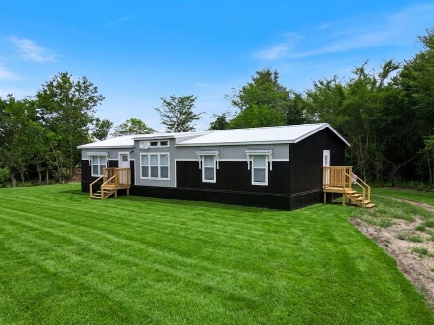 Welcome to peaceful country living in Kerens! This brand-new 3-bedroom, 2-bath manufactured home sits on 1 full acre, offering the perfect blend of modern comfort and open space.

Step inside to an inviting open-concept layout featuring a spacious living area, stylish recessed lighting, and a beautiful kitchen complete with an oversized island, sleek countertops, stainless farmhouse sink, and ample cabinet space, perfect for entertaining or everyday living. The neutral finishes throughout create a bright, modern feel that is move-in ready.

The private primary suite offers a relaxing retreat, while two additional bedrooms provide flexibility for family, guests, or a home office. Outside, enjoy the freedom of one acre of land, giving you plenty of room for outdoor living, gardening, hobbies, or simply enjoying the peace and privacy of the countryside.

If you’re looking for affordable new construction with land, this property delivers the space, style, and tranquility you’ve been searching for, all while being conveniently located near town amenities.