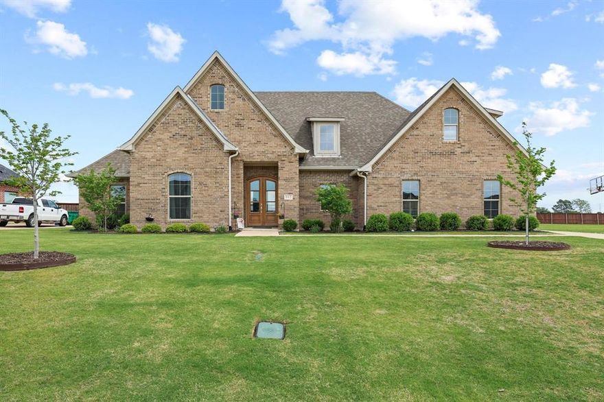 If you’ve been looking for space, privacy, and a layout that actually lives well—this is it.

Set on a rare ½-acre lot in Lake Country Crossing, this 4-bedroom, 3-bath home delivers both inside and out. The open-concept design creates clean sightlines across the main living areas, giving the home a bright, connected feel that’s perfect for everyday living and entertaining.

The kitchen is the centerpiece, featuring a true walk-in pantry with the kind of storage space you don’t often find—designed for real life, not just looks.
Upstairs, a private bonus suite with full bath offers flexibility for guests, a game room, or a quiet retreat separate from the main living areas.

Step outside and you’ll see where this home really separates itself—a deep ½-acre lot paired with a functional outdoor living space, giving you room to relax, host, and actually enjoy your backyard with added privacy.

Tucked on a quiet street just minutes from Lake Texoma, this home combines space, function, and location in a way that’s hard to find.