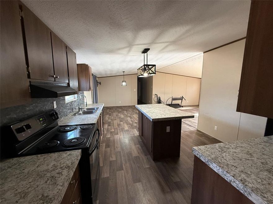 Check out this spacious 5-bedroom, 3-bath home sitting on nearly 5 acres in North Hopkins ISD, offering an ideal layout for multi-generational living. With ample bedrooms and flexible living spaces, this property provides room for extended family, guests, or home office needs. The expansive acreage allows for privacy and future additions, while an 18’ x 20’ carport offers covered parking or storage. An electric pole located toward the back of the property adds convenience for potential expansion. Enjoy peaceful country living with the space and versatility to accommodate multiple generations under one roof.