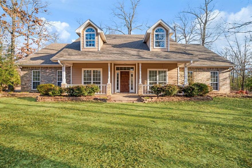 Private lake access on 3.17 wooded acres. This beautiful 4 bedroom, 2 bath home offers a perfect blend of comfort and tranquility. Ideal for the buyer seeking both space and nature. With a thoughtfully designed split bedroom arrangement, this home ensures privacy for everyone and togetherness in the heart of the home that features vaulted ceilings, floor to ceiling windows and a beautiful fireplace! As you step inside, you'll be greeted by warm interiors featuring spacious living and modern kitchen that will make meal prep a delight! Imagine preparing your holiday meals in this well appointed kitchen. The expansive outdoor space is perfect for hosting barbecues or just relaxing and enjoying nature. Just a short walk or ride away from your doorstep lies private lake access, a hidden gem waiting to be explored and enjoyed. Spend weekends fishing, kayaking or simply enjoying the peaceful ambiance of lakeside living. Don't miss out on this unique opportunity to own a slice of paradise conveniently located between Paris and the Red River! Schedule your showing today and find out what makes this property so special! 

Don't miss out on this unique opportunity to own a slice of paradise conveniently located between Paris and the Red River!  Schedule your showing today and find out what makes this property so special!