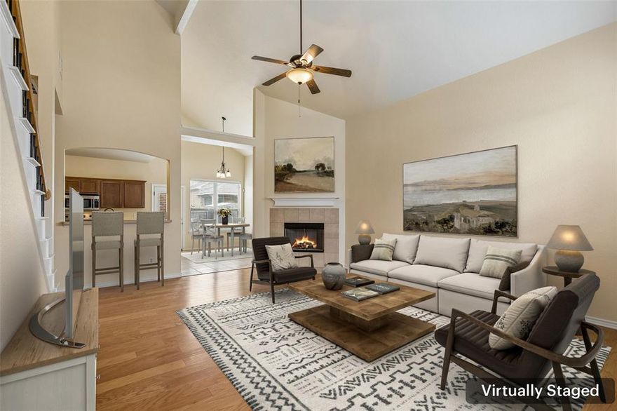 Gorgeous brick traditional home offering 3 bedrooms and 2.5 baths with a spacious, flexible layout designed for comfortable living. The inviting main living room showcases soaring cathedral ceilings, rich wood flooring, and a cozy fireplace that creates a warm focal point for gathering and relaxing. 
The eat-in kitchen is well-appointed with built-in stainless steel appliances, a breakfast bar with seating, and generous prep space, making it ideal for both everyday living and entertaining. The private primary suite is conveniently located on the main level and features an ensuite bath and walk-in closet. Upstairs, you’ll find spacious secondary bedrooms and a full bath, along with a large second living area and an enormous flex space that offers endless possibilities. This expansive area could easily be converted into an additional bedroom if desired, while the second living space is also large enough to accommodate a fifth bedroom, media room, home office, or hobby space. Freshly painted throughout, this move-in ready home also features newly installed epoxy flooring in the garage for a clean, polished finish. Outside, enjoy a private backyard with a covered patio, offering a comfortable space for relaxing or entertaining. Meticulously maintained and thoughtfully designed, this home offers both versatility and comfort, ready to welcome its next owner. 3D tour online.