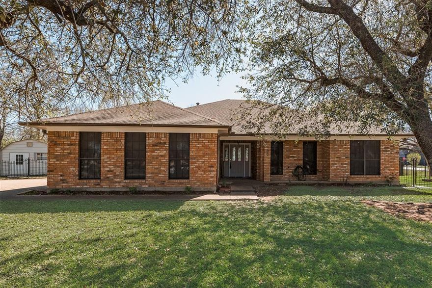 BACK ON THE MARKET AT NO FAULT OF THE SELLERS-Charming Wills Point Home - Convenience Meets Comfort! ROOF REPLACED NOVEMBER 2025

Discover the perfect blend of charm and functionality in this delightful 3-bedroom, 2-bath home, ideally located just 2 minutes from grocery stores and essential amenities. Positioned on a desirable corner lot, this brick residence offers excellent curb appeal and a warm, inviting atmosphere.

Step inside to find a spacious layout featuring a formal dining room perfect for hosting gatherings and a cozy living area complete with a welcoming fireplace. The eat-in kitchen is designed for both convenience and style, offering ample space for casual dining and culinary endeavors.

The oversized primary bedroom becomes your personal retreat, boasting an additional cozy office space, ideal for remote work or relaxation. Secondary bedrooms provide generous space for comfort and versatility.

Outside, the property features a well-maintained yard, enhancing the home's charming appeal and providing potential for outdoor enjoyment.