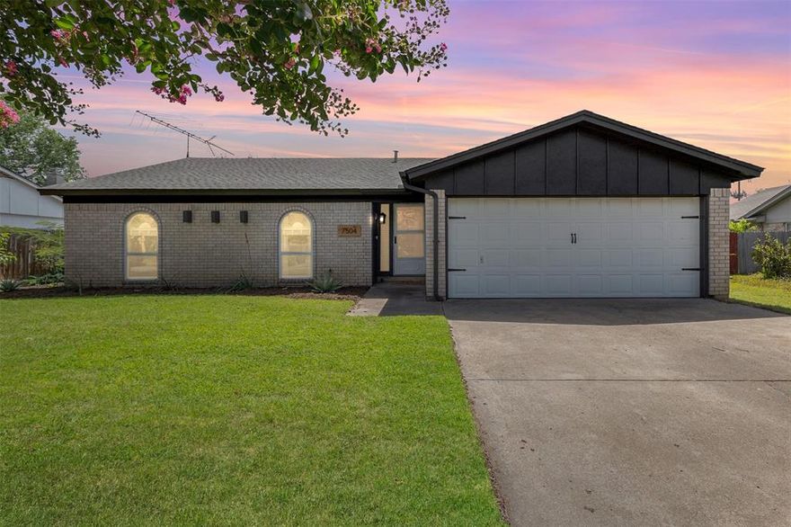 Welcome to this meticulously maintained and beautifully updated single-story ranch-style home in the heart of North Richland Hills. Perfectly positioned between Fort Worth and Colleyville, this home combines convenience, comfort, and style in one of the area’s most desirable and established neighborhoods. Step inside and you'll be greeted by stunning laminate wood floors, soaring vaulted ceilings, and a contemporary designer paint palette that brings a fresh, modern feel to every room. The kitchen is a true highlight, featuring granite countertops, a sleek decorative floor to ceiling tile backsplash, and an open layout that flows effortlessly into the dining and living areas—ideal for entertaining and everyday life.

This smart floor plan makes excellent use of space, offering just the right balance between open-concept living and private retreats. All three bedrooms are generously sized, with the master suite boasting a large walk-in closet and a layout that ensures maximum privacy. Natural light pours in through ample windows throughout the home, creating a bright and uplifting atmosphere, ideal for relaxation or working from home.

Step outside to a truly impressive backyard—spacious, grassy, and bordered by a handsome brick wall that offers additional privacy from the nearby North Richland Hills Early Care and Education Center. Whether you’re enjoying your morning coffee on the patio or hosting weekend get-togethers, the outdoor space is a standout feature. If you're looking for a low-maintenance, high-comfort home in a peaceful and welcoming community, this one checks all the boxes. Nothing beats seeing it yourself, so don’t miss your chance to own this North Richland Hills gem!