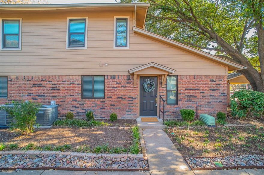 Beautifully renovated Townhome in the Cedar Creek gated community. Located near I-20 and Bryant Irvin.  Enjoy the convenience of shopping, schools, churches, freeways, Trinity Trails walking and bike trails - all nearby. Enter a haven of large trees, well-maintained homes with private patios, convenient parking, sidewalks, and an inviting pool and community area. Come home to a cozy living and dining area featuring a wood-burning fireplace, beautiful luxury vinyl plank flooring, as well as new carpet in the stairwell and bedrooms. Well-planned kitchen with eating area, opens to the living area and patio. Enjoy energy-efficient windows, new window blinds, new stainless steel appliances, new LED light fixtures, a new water heater, and three state-of-the-art ceiling fans. Two primary-sized bedrooms with ensuite baths. The downstairs bath has a large walk-in shower and two closets. The included washer and dryer are located off the kitchen area. The landlord has final approval of all animals. Per HOA, all fully grown animals are not to weigh over 45lbs. All Patio fences are being replaced. The patio of this unit is being renovated with either cement replacement or gravel and stepping stones. Don't miss this jewel of a home. All electric. Water included. Applicant to verify school assignments. All measurements are approximate. Easy living is included.