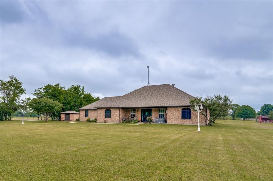 Tucked away on a peaceful stretch of acreage in Caddo Mills, this 2-acre property delivers the kind of quiet country living people dream about—where the neighbors have horses and goats, and the pace of life just feels a little easier.

Surrounded by beautiful homes and set on a flat, usable lot, this 3-bedroom, 2-bath home offers both charm and opportunity. Step inside to find a spacious living room perfect for gathering, along with new LVP flooring throughout the main areas that adds a fresh, modern touch. The primary suite is a standout, featuring a beautifully remodeled bathroom and an oversized closet that feels more like its own room.

Outside is where this property really shines. Enjoy evenings by the above-ground pool, take in the peaceful views around your private pond, or simply relax and appreciate the mature trees lining the perimeter for added privacy. The landscaping is thoughtfully done, creating a warm and welcoming first impression.

Need space for your hobbies, toys, or future plans? You’ve got it. A separate brick storage shed with a shingled roof is already in place, and with this much land, you have the freedom to build a workshop, add a casita, or design the outdoor setup you’ve always wanted.

Flat, functional, and full of possibility—this is your chance to own a slice of country living without sacrificing comfort or style. Selling home as-is.