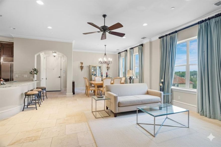 Welcome to 6601 Mediterranean Drive #6302—experience the magic of Adriatica Village, McKinney’s iconic lakeside oasis modeled after a charming Croatian town. This meticulously maintained 1-bedroom, 1.5-bath condo is a spacious retreat with 1,405 square feet of luxury, soaring ceilings, intricate crown molding, and elegant marble tile that set a warm European tone. Entertain in style with an open-concept living and dining room, chef’s kitchen with exotic granite, double ovens, induction cooktop and walk-in pantry, or retreat to your master suite's private balcony for breathtaking views of the lake and Bella Donna Chapel.? The spa-inspired ensuite boasts dual vanities, an oversized shower, and spacious closets. Enjoy your morning coffee on the balcony, stroll through walkable cobblestone streets, and indulge in a vibrant mix of shops and restaurants—all just steps away. Additional highlights include a storage unit, scenic walking trails, and security in a truly unique, storybook setting where every day feels like a European getaway.  Don't miss the chance to own a piece of Adriatica’s unrivaled charm—schedule your private tour today