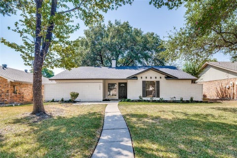 Photo of 1022 Holland Drive, Garland, TX 75040 (MLS # 21383441)