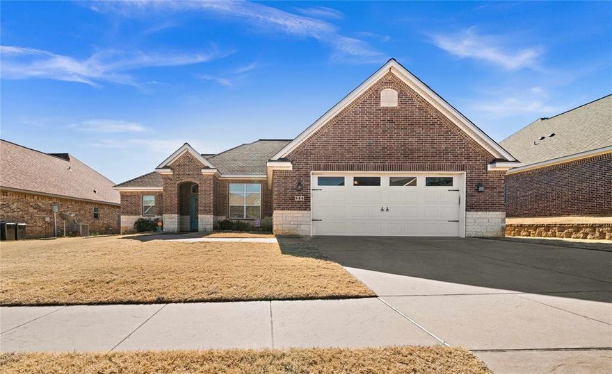 Welcome to your dream home in the highly sought-after Lindale ISD, nestled within the charming Ruby Trails subdivision. Step inside and be captivated by the sleek and stylish concrete floors that set the tone for the entire home. The heart of this residence is the newly updated kitchen, featuring granite countertops that exude elegance and functionality. The subway tile backsplash adds a contemporary touch, while a playful hexagon accent brings a touch of uniqueness to the space along with a shiplapped accent on the island making it a delightful spot for culinary enthusiasts and family gatherings. This three-bedroom, two-bathroom home is designed with comfort and convenience in mind. The master bathroom has undergone a tasteful transformation, boasting modern updates that elevate your daily routine. Enjoy a spa-like experience with the upgraded fixtures and a refined aesthetic that creates a serene atmosphere.