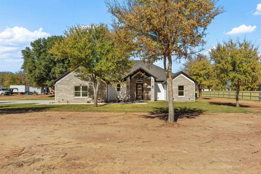 GA HOMES NEWEST NEW HOME CONSTRUCTION LOCATED ON 1 ACRE!!!!!! Surrounded by towering, mature trees that provide year-round beauty and privacy, this home is a sanctuary for those seeking peace, comfort, and natural beauty. The main kitchen features include a gas stove, custom cabinetry, and a spacious island perfect for entertaining. Adjacent to the kitchen is a cozy family room, where you can unwind by the fireplace while enjoying panoramic views of the peaceful outdoors. Don't waste time and come see this home as it is priced to sell and wont last on the market very long! Want to enjoy your time on the lake? The nearest Boat ramp is just 2 MINUTES AWAY. (boat ramp located on Port O call Ct)